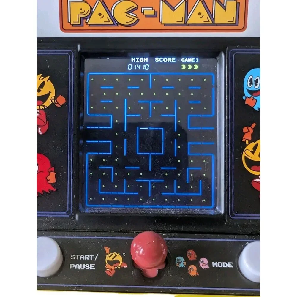 Pac-Man Retro Hand Held Mini Electronic Arcade Game Works No Batteries Included